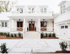 a large white house with lots of windows