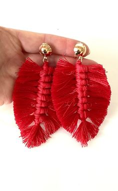 Clip on, red boho tassel statement earrings from Olivia Divine. Drop style, tassel earrings. Clip on, with a gold tone metal top. Lightweight. Length 10 cm approx. Red Boho, Tassel Earrings, Gold Tone Metal, Clip On, Clip On Earrings, Statement Earrings, Hippie Boho, Etsy Earrings, Tassels