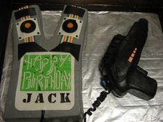 a birthday cake made to look like a pair of boxing gloves and an electric guitar