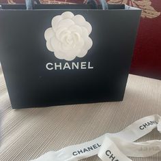 Chanel Paper Bag With The White Rose Embellishment, Long Ribbon And Receipt Envelope, Perfect Condition Measurements In The Pictures Elegant Bag With Ribbon For Gift, Chanel Paper Bag, Receipt Envelope, Chanel Black And White, Chanel Accessories, Chanel Black, White Rose, White Roses, Chanel Bag