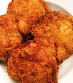 some fried food is on a white plate