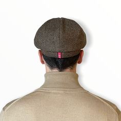 Hand-made hat in brown Donegal-style lambswool, Albert’s Brandy is a modern take on the Bakerboy flat cap featuring a distinctive headband round the back and a stud button in the peak.100% Merino lambswoolMaster Hatter to Savile Row, St James's and the Peaky Blinders, Mister Miller is now flying solo.With a career spanning 3 decades, hand-making the best of Britain's hats with the finest materials for him, her, them. There are bespoke and monogramming services to boot, and something to crown eve Classic Wool Flat Cap Beret, Brown Wool Flat Cap, Fitted Wool Flat Cap, Classic Wool Beret With Curved Brim, Classic Wool Beret With Short Brim, Classic Winter Six-panel Beret, Classic Six-panel Winter Beret, Fitted Six-panel Winter Hat, Fitted Winter Six-panel Hats