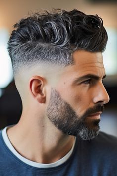 Embrace elegance with a low taper fade haircut paired with a wavy pompadour. This hairstyle features a pompadour with waves for added texture. Click here to check out more handsome low taper fade haircuts for men. Textured Low Taper, High Top Haircut, Men's Cuts