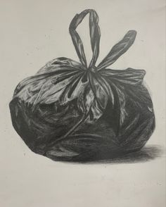 a black and white drawing of a garbage bag