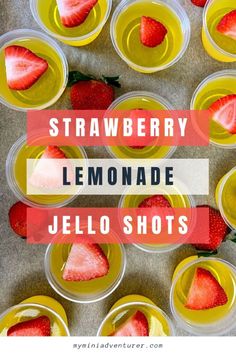 strawberry lemonade jello shots in plastic cups with strawberries