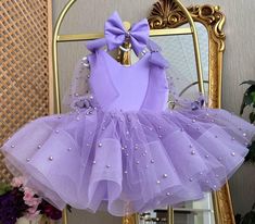 Sequined Purple Baby Dress With Ribbon, Tutu First Birthday Dress, Pageant Party Girl Dress, Toddler Puffy Dress, Baby Princess Dress This baby girl dress is specially designed and handmade for your baby girl. Your girl will be like a princess with these dresses that she can wear on special occasions such as birthdays, weddings and christmas. This dress, which will create your girl's style with a clasp and shoes, is ideal for special occasions. Check out our baby girl dresses selection for unique handmade dresses from AymiraDesign. ✿ Product Features; ✰ Baby Dress Materials: Tulle ✰ Baby Dress Color: Purple ✰ Set Content: Dress, Clasp ✰ Size Options: * 0-3 months, 3-6 months, 6-9 months, 9-12 months, 12-18 months, 18-24 months, 2T, 3T, 4T, 5, 6 US kids' numeric More from Baby Girl Dress Co Sweet Easter Party Dress, Sweet Easter Party Dresses, Purple Summer Baptism Dress, Summer Purple Dress For Baptism, Summer Baptism Purple Dress, Cute Purple Baptism Dress, Cute Purple Dresses For Baptism, Cute Purple Dress For Baptism, Purple Ruffle Dress For Baptism