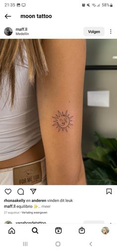 a woman with a sun tattoo on her arm