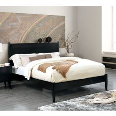 a bedroom with a bed, night stand and nightstands