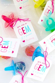 small candy bags with tags on them that say, you are a gem