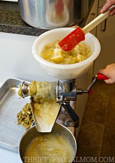 a person stirring food in a bowl on top of a stove