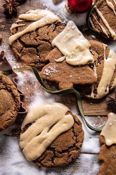 cookies with icing and cinnamon on a table