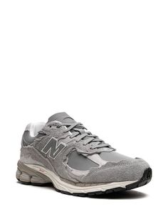 Gray Lace-up Sneakers, Gray High-top Sneakers With Round Toe For Jogging, New Balance Sneakers With Vibram Sole For Streetwear, Gray Lace-up Running Shoes For Streetwear, New Balance Running Shoes For Streetwear With Laces, Gray Sneakers With Rubber Sole, Gray Functional Sneakers With Rubber Sole, Gray Running Shoes With Boost Midsole For Streetwear, Functional Gray Sneakers With Rubber Sole