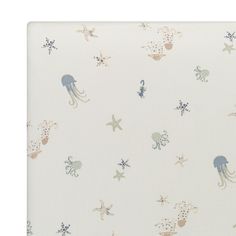 an ocean themed wallpaper with jellyfish, octopus and starfish on white background