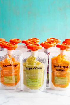 six bags of baby and toddler squeezes are lined up in front of each other