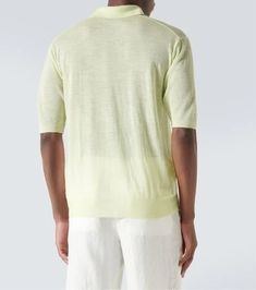 Material: 85% wool, 15% silk.Care instructions: dry clean.Made in Japan.Designer color name: Lime Yellow.Collar: polo collar.Hem: ribbed, straight.Cuff: ribbed.True to size.Semi-sheer.Designed for a loose fit.Stretchy fabric.Falls to the hip.The model in the picture is 185cm-6'1' and wearing a size 4 Classic Crew Neck Polo Sweater For Spring, Classic Spring Polo Shirt With Crew Neck, Classic Crew Neck Polo Shirt For Spring, Classic Spring Crew Neck Polo Shirt, Lime Yellow, Polo Sweater, Polo Collar, Color Names, Polo Shirts