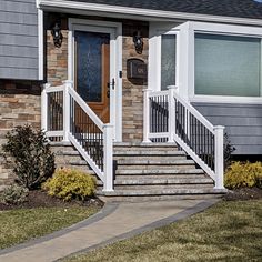 a house with steps leading up to the front door