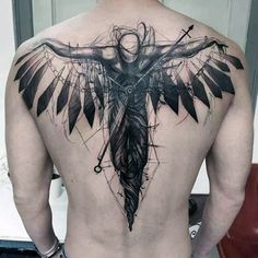 the back of a man with a tattoo on his body and an angel holding a cross