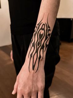 a person with a tattoo on their arm