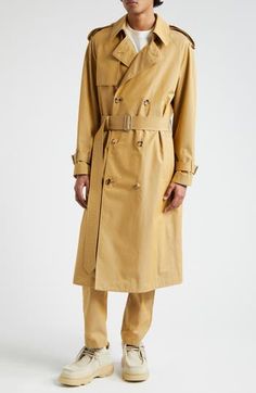 Burberry wraps itself in a heritage homage with this iconic-to-its-lining double-breasted trench coat styled with every classic detail from cotton gabardine. 49" length (size 50 IT) Double-breasted button closure Notched lapels with hook-and-eye throat latch Belted cuffs Side welt pockets Removable belt Epaulets Gun flap Storm flap Back vent Water-resistant Lined with check-patterned cotton fabric 100% cotton Dry clean Made in Italy Designer Clothing Burberry Trench Coat Men, Men's Trench Coat, Designer Clothing Brands, Blue Trench Coat, Trench Coat Style, Burberry Trench, Burberry Trench Coat, Trench Coat Men, Double Breasted Trench Coat