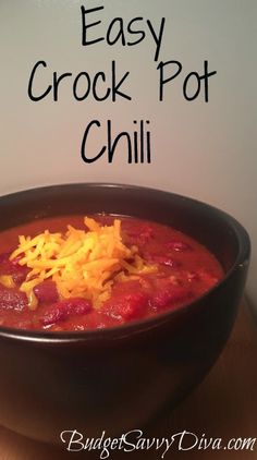 easy crock pot chili in a black bowl with shredded cheese on top and the words, easy crock pot chili