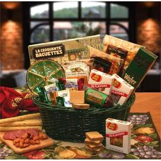 a basket filled with snacks and crackers on top of a table