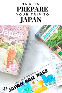 the japanese passport and tickets are sitting on top of a marble table with text overlay that reads how to prepare your trip to japan