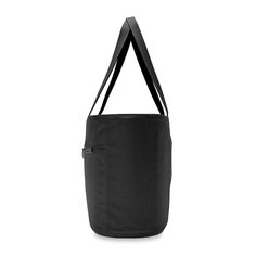 This Traveler Tote is a must-have for a life of travel. Make this your go-to bag on trips near and far. Its spacious capacity allows you to fit it all. Travel Tote Bag, Travel Tote, Shopping Tote, Travel Companion, Carry On Bag, Black Tote Bag, Shopping Trip, Front Pocket, Top Handle