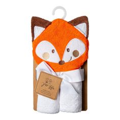 an orange and white towel with a fox face on it