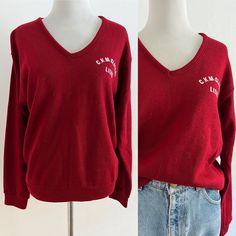 "Charming 70's red v-neck letterman style sweater.  Embroidered \"C.K. McClatchy Lions\" Acrylic, rayon Size medium Armpit 19\" Shoulder to hem 34\" Excellent condition" Cotton V-neck Sweater For College, Casual V-neck College Sweatshirt, V-neck Tops For College In Winter, Red College Sweater With Ribbed Cuffs, Red Collegiate Cotton Sweater, Vintage Cotton V-neck Sweater, Red Cotton V-neck Sweater, Fall College V-neck Tops, Fall V-neck Tops For College