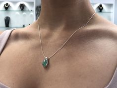 Featured here is a stunning, cabochon oval Colombian emerald necklace in fine .925 sterling silver. Displayed is a light-green emerald bezel set in an elongated silver setting. The earth mined, green Colombian emerald has a light green color with good clarity. An 18 inch chain is included with the emerald pendant. This is an excellent gift for a May baby or for someone who simply loves emeralds. Total Carat Weight: 5.0cts Setting Style: Bezel Setting Material: .925 Sterling Silver Main Stone: Co Elegant Oval Cabochon Gemstones, Elegant Birthstone Jewelry In Oval Cabochon, Elegant Oval Cabochon Emerald Necklace, Elegant Oval Cabochon Birthstone Jewelry, Elegant Cabochon Teardrop Pendant Necklace, Fine Jewelry Cabochon Gemstone Pendant, Elegant Teardrop Pendant Cabochon Necklace, Teardrop Cabochon Necklace For Anniversary, Elegant Formal Cabochon Emerald Necklace