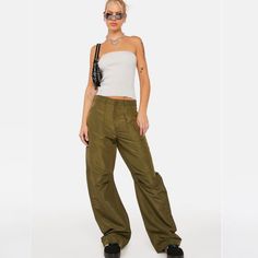 Description: Lioness Jungle Green Miami Vice Swish Pants Cuz You Make Your Own Rules. These Baggy Low Rise Pants Have A Poly Nylon Construction, Six Pocket Details, Pintuck Seams At The Knees, And A Zip-Fly Closure. Details: Model Is 5’10” Green 95% Polyester, 5% Nylon Tan Jumpsuit, Knit Tube Top, Low Rise Pants, Beige Pants, Jungle Green, Leather Pant, Miami Vice, Top And Pants Set, Wide Leg Linen Pants