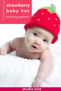 a baby wearing a knitted strawberry hat on top of a white blanket with text overlay that reads, strawberry baby hat knitting pattern