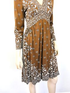 "Vintage 1970s Brown & White Dress - V neckline - zips at back - pucci style graphic print - brown & white color - jersey type material Great vintage condition. size - S 36\" bust 26\" waist full hip 38\" length 21\" sleeve US sales/shipping only. All sales are final / as-is. We do not accept returns." Retro Brown V-neck Dress, Vintage Printed Brown Dress, 1970s Fitted Brown Dress, Fitted Brown 1970s Dress, Brown Vintage Printed Dress, Fitted Brown 1970s Style Dresses, Vintage Brown Printed Dress, Vintage Pucci, Pucci Vintage