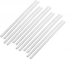 six white plastic straws on a white background