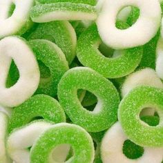 green and white donuts with sugar on them