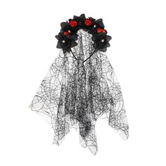 a black and white veil with red roses on it's headpiece, hanging from the ceiling