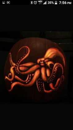 a carved pumpkin with an octopus on it