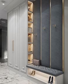 a walk in closet with marble floors and white walls