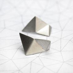 "▲Faceted triangle earrings made of sterling silver. Four planes of triangles, very modern and minimalist.   Part of the \"ode to the triangle\" collection.   ▲Matt finish. ▲Measures:   each earring: 0.51\" width and 0.98\" long  (13 x 25mm)  BUY 2 (or more) PRODUCTS, PAY ONLY 1 SHIPPING  --------------------------------------------------------------------------------------------------------------------------- ● All the jewels are designed and handmade by me.  ● Shipments: I ship from Argentina, Cloud Ring, Tiny Cats, Sterling Silver Cat, Silver Cat, The Triangle, Triangle Earrings, Geometric Jewelry, Cat Earrings, Earrings Sterling Silver