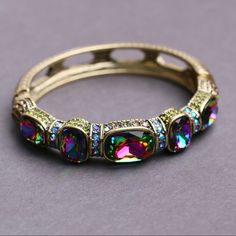 Less Isn��’t Always More. Be Bold, Be Beautiful, Be You With This Showstopping, Sparkle-Loaded Crystal Bracelet Set. Wear One Or All Three Together To Transform An Everyday Look Into Wow. Oval Bangle Bracelet - Multi-Way, Large Crystals In Bezel Settings - Petite, Pav Round Crystals - Textured Metalwork Back With Open, Geometric Cutout Designs Measurement: Approx. 7-1/2”L; Fits 7” To 7-1/2” Wrist 7/8”W (On The Rocks Cuff Bracelet) Size: M/L Brand New Without Tag. Multicolor Jeweled Bracelets, Elegant Multicolor Bangle For Parties, Oval Bangle, Heidi Daus, Crystal Bangle, Jewelry Accessories Ideas, Accessories Ideas, On The Rocks, Be Beautiful