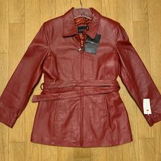 I Have A Brand New With Tags Red Leather Jacket By Ciro Citterio. This Lovely Jacket Would Make A Perfect Christmas Gift. It Has A Silky Lining And Includes A Belt. Also Has Some Hidden Pockets On The Inside (See Pics). This Jacket Retails New For $399 Classic Red Leather Jacket For Work, Red Leather Jacket For Winter Workwear, Classic Red Outerwear For Fall, Winter Red Leather Jacket For Work, Red Leather Outerwear For Work, Classic Red Fall Outerwear, Wine Red Leather Jacket, Classic Red Leather Outerwear, Classic Red Leather Jacket With Button Closure