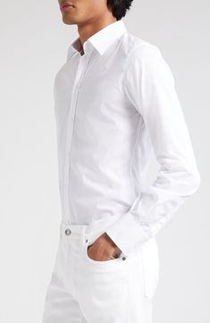 A smart wardrobe essential, this Italian-crafted shirt is cut from pure cotton poplin for a crisp look and easy movement. 30" length; 40 1/2" chest (size 40) Raised placket Point collar Long sleeves with button cuffs 100% cotton Machine wash, line dry Made in Italy Designer Clothing White Shirt With Hidden Button Closure For Spring, Timeless Cotton Shirt For Daywear, Cotton Dress Shirt With Concealed Placket For Daywear, White Relaxed Fit Poplin Shirt, Fitted Cotton Dress Shirt For Daywear, White Poplin Tops With Button Cuffs, White Poplin Top With Spread Collar, Modern Button-up Dress Shirt For Daywear, White Cotton Shirt With Concealed Placket