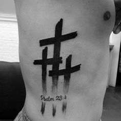 a man with a cross tattoo on his stomach and the words paul 29 1 written in black ink