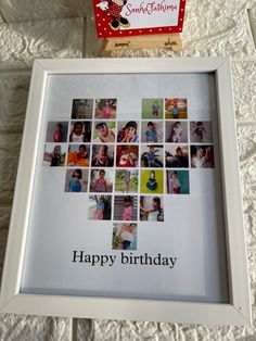 a white frame with many pictures in it