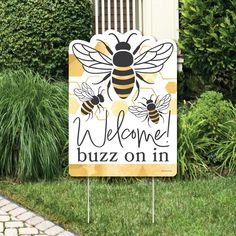 a welcome to devon's bee party sign in front of some grass and bushes