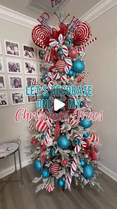 a christmas tree decorated with red, white and blue ornaments is featured in this video