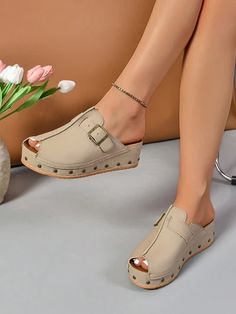 Studded Elegance: Women's Red Wedge Heel Sandals with Beige Cloth Summer Wedge Sandals With Buckle Closure, Slip-on, Summer Platform Flat Clogs, Chic Wedge Heel Clogs With Buckle Closure, Trendy Summer Wedge Heel Clogs, Trendy Summer Clogs With Wedge Heel, Trendy Closed Toe Wedge Sandals With Buckle Closure, Summer Platform Slippers With Buckle Closure And Round Toe, Spring Buckle Closure Wedge Heel Clogs, Spring Wedge Heel Clogs With Buckle Closure