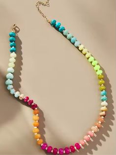 Indulge in luxury with our Rainbow Stone Necklace, featuring a stunning mix of beads in vibrant colors. Unleash your inner artist with our Rainbow Necklace. Length 16' with 1 1/2' gold extender and lobster claw clasp. This product was made by one of our partner companies. Fun Rainbow Necklaces With Colorful Beads, Playful Rainbow Necklaces With Round Beads, Playful Rainbow Beaded Necklaces, Playful Rainbow Necklace With Colorful Beads, Rainbow Multi-strand Beaded Necklaces, Stacked Earrings, Rainbow Necklace, Rose Earrings, Rose Gold Necklace