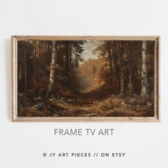 a painting hanging on the side of a wall next to a wooden frame with words frames tv art