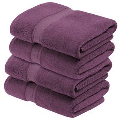 six purple towels stacked on top of each other